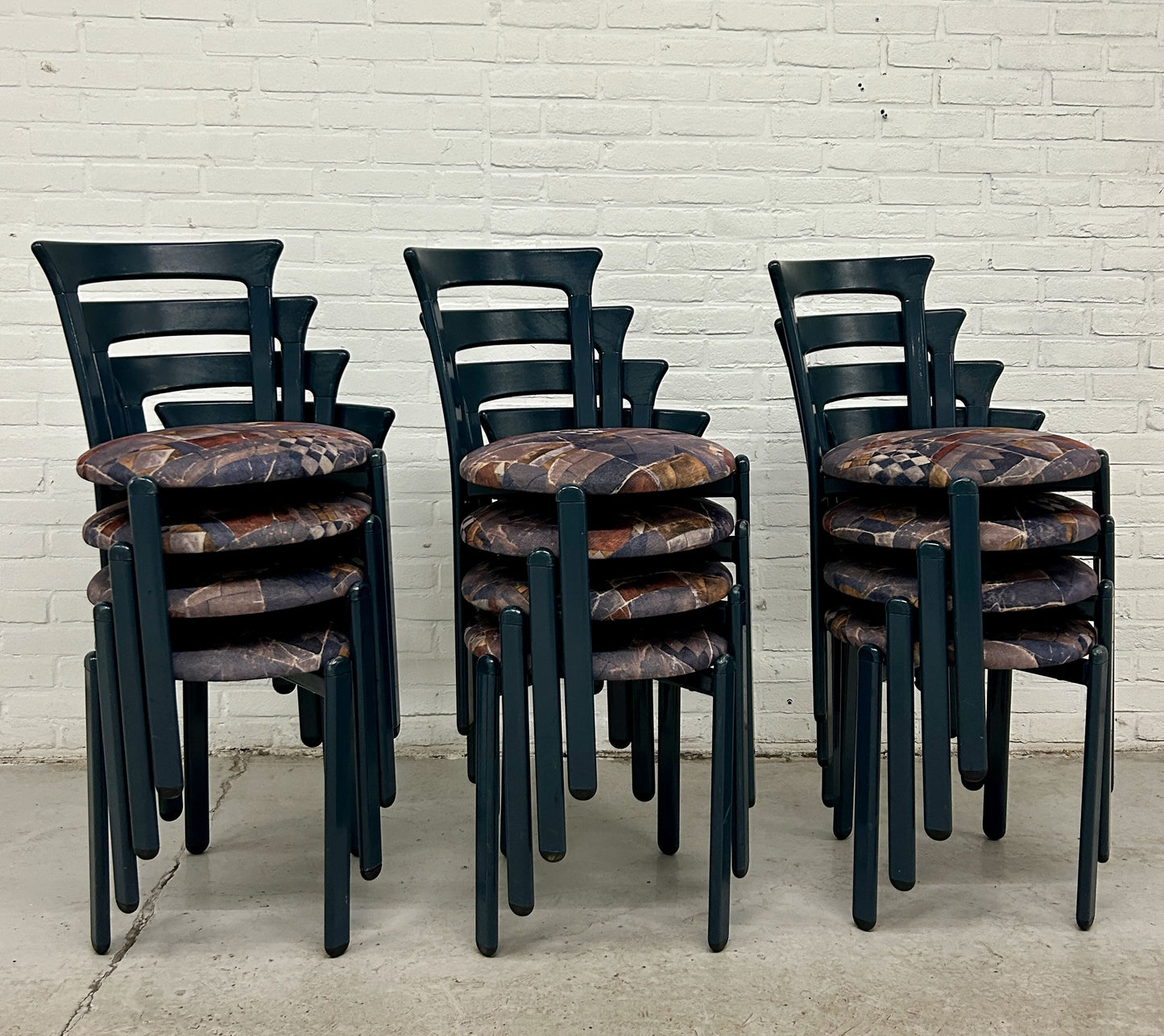 12 vintage Bruno Rey stijl stapelstoelen
