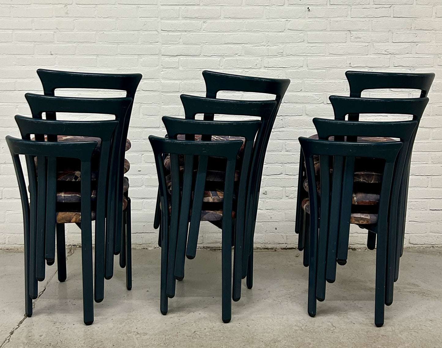 12 vintage Bruno Rey stijl stapelstoelen
